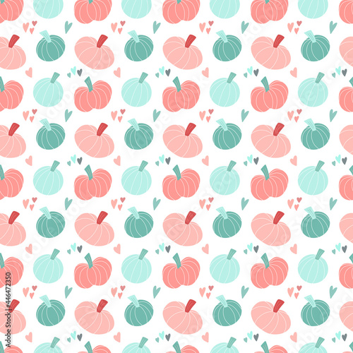 Cute seamless pattern with pastel pumpkins hand drawn in simple childish Scandinavian style and colorful hearts. Vector sweet background. Design for autumn,Thanksgiving, kids Halloween