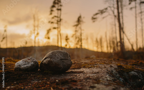 place for meditation, stones on the background of sunset in karelia