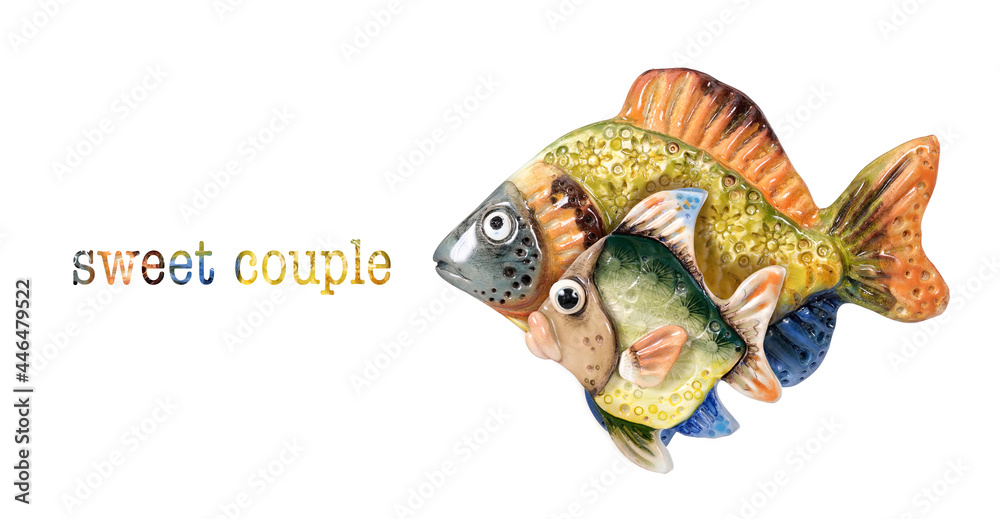 Funny ceramic a pair of fish isolated on white background