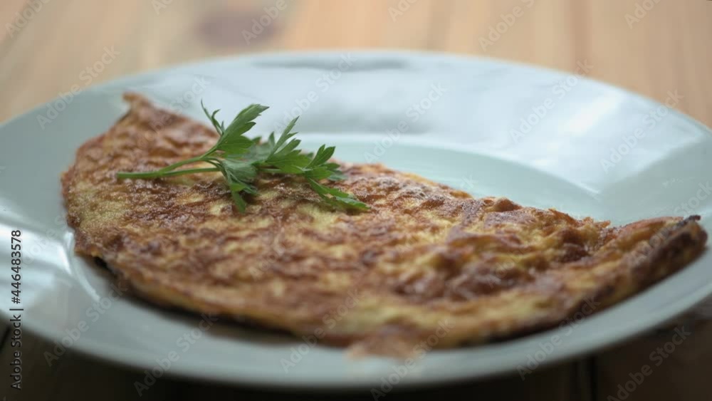 Cooking an cheese omelet in home kitchen Cooking an cheese omelet in home kitchen