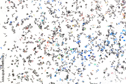 Φωτογραφία A pattern with tangled letters on the white background