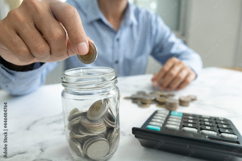 Fototapeta premium Businessman saving money concept.