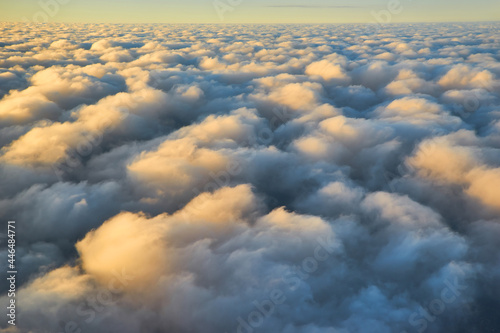 Fototapeta Naklejka Na Ścianę i Meble -  View of the beautiful sky and clouds from the window of the airplane. Sunset sky from the window of the airplane.