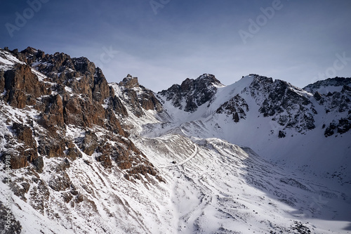 Snow Rocky Mountains with Blue Sky in Kazakhstan 