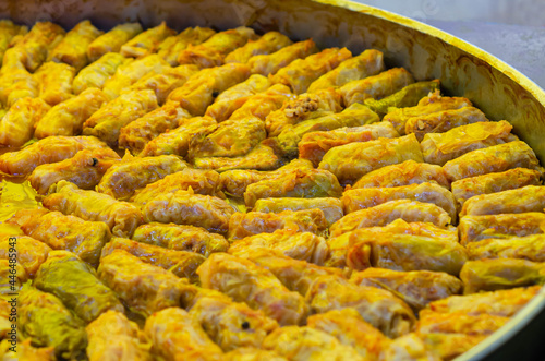 Romanian traditional food – Sarmale. Stuffed cabbage rolls with meat and rice boiled in a pan, ready for serving  photo