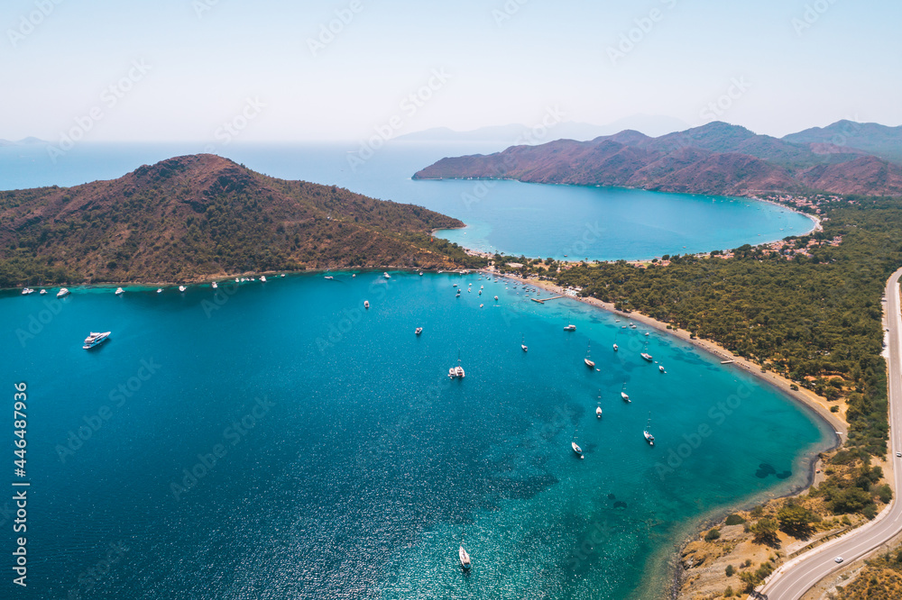 Mediterranean coast of Datca peninsula. The coastline of Datca runs and consists of big and small, deep and crystal blue coves. Drone view.  Mugla. Turkey