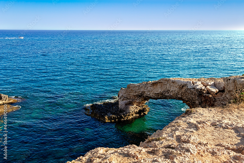 A picturesque natural rock called Love Bridge. Located in the resort town of Ayia Napa on the island of Cyprus. Mediterranean Sea.