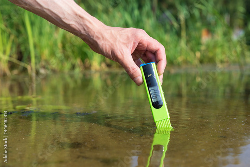 Measure water content with digital device. PH meter.