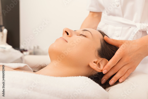 Young Woman during Spa Salon. Woman Relaxes in the spa.