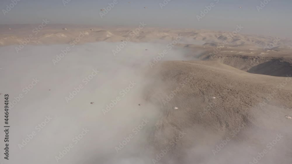 Alien desert world with ufo's Fleet and mist clouds, aerial view Desert ...