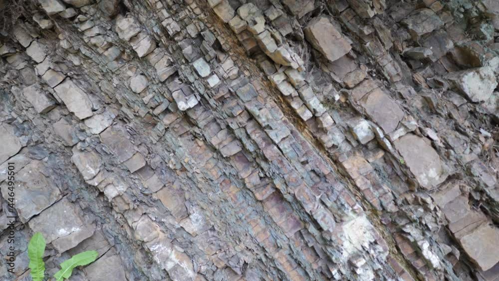Raw layered rock texture, stone close-up Raw layered rock texture, stone close-up