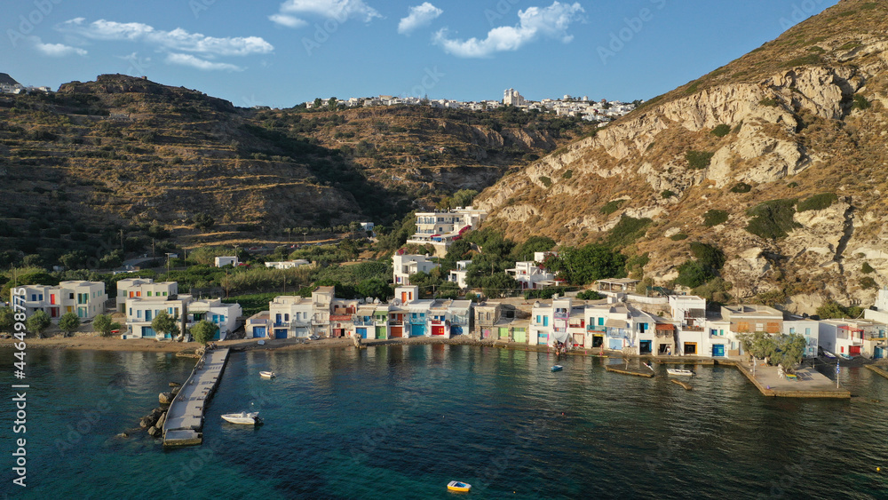 Aerial drone photo of picturesque seaside village of Klima and traditional fishermen settlement with colourful boat garages called syrmata in island of Milos, Cyclades, Greece Aerial drone photo of picturesque seaside village of Klima and traditional fishermen settlement with colourful boat garages called syrmata in island of Milos, Cyclades, Greece