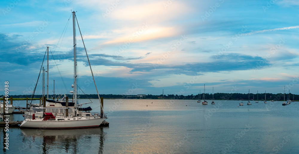 panorama of a sailboat in a harbor on the lake