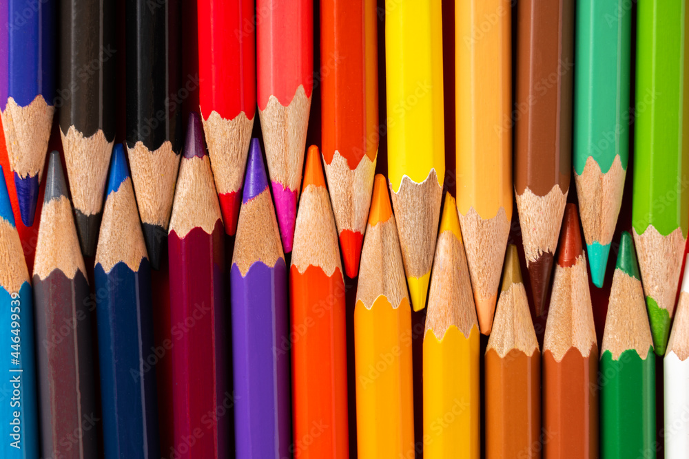 Colorful pencils on red background.Pencil background, Education concept and back to school concept.Top view Colorful pencils on red background.Pencil background, Education concept and back to school concept.Top view
