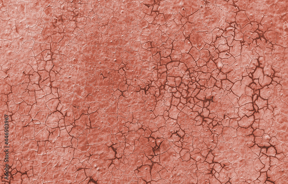 Texture of rough painted terracotta wall cracked from time Texture of rough painted terracotta wall cracked from time