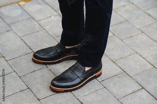 Male elegant shoes and trousers.