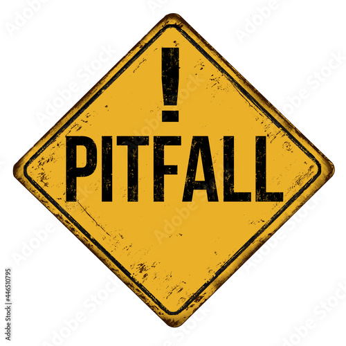 Pitfall vintage rusty metal sign