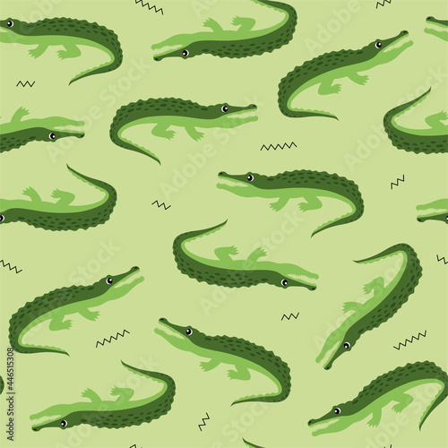 Animal seamless pattern and textile design. Vector illustration with cute green crocodile on light green background. Good for t-shirt design, fabric print, greeting card, wrapping, wallpapers.