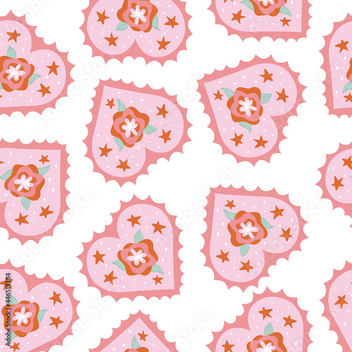 Seamless vector pattern with hearts and flowers. Pink background