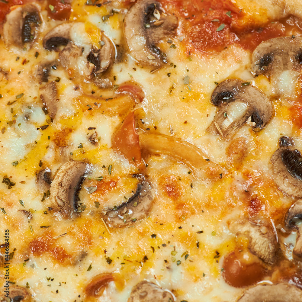 rustic pizza with mushrooms on wooden board and yellow background rustic pizza with mushrooms on wooden board and yellow background