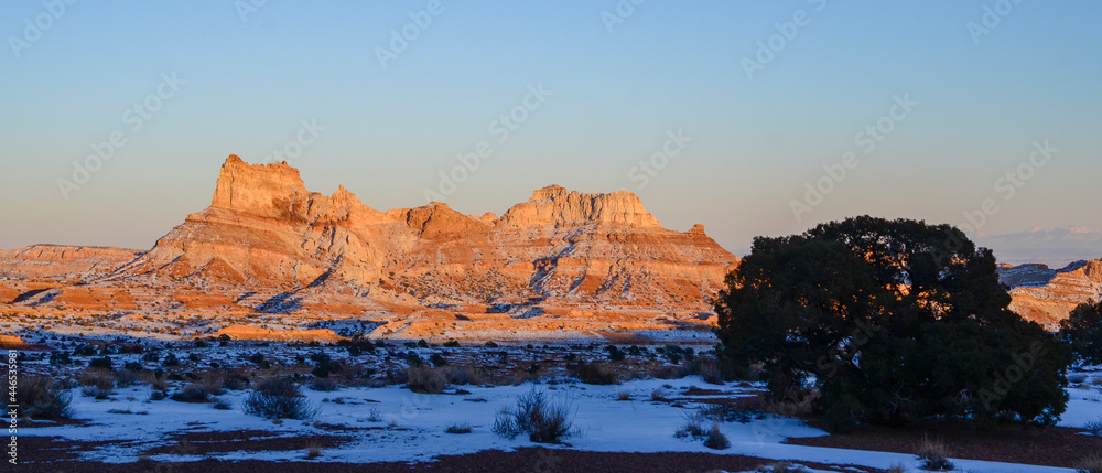 Winter in the American Southwest. Snow Covered Redrock Cliffs Driving Tourism