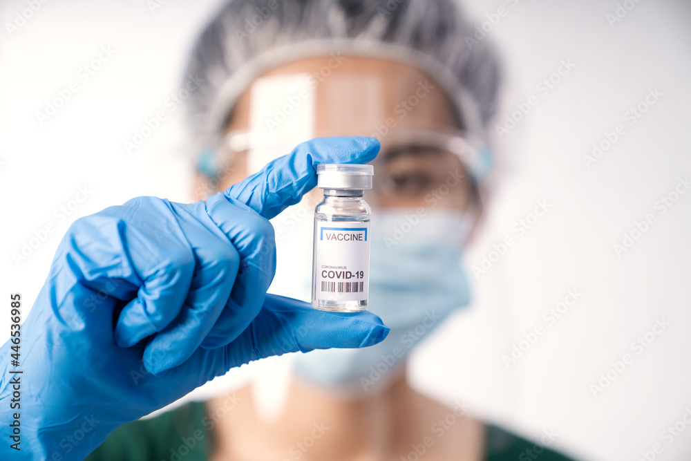 close-up scientist holding vaccine coronavirus in lap close-up scientist holding vaccine coronavirus in lap