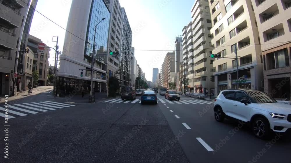 A pov timelapse of driving cityscape on the urban street in Tokyo A pov timelapse of driving cityscape on the urban street in Tokyo
