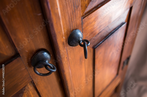 Wooden interior door with handle.