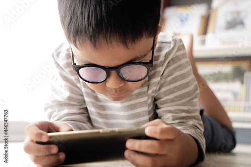 Asian boy play game