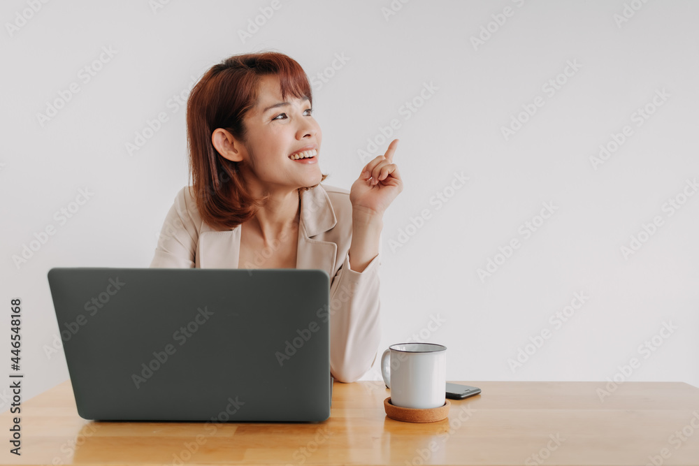 Business woman with laptop looks at empty space isolated on white background. Business woman with laptop looks at empty space isolated on white background.