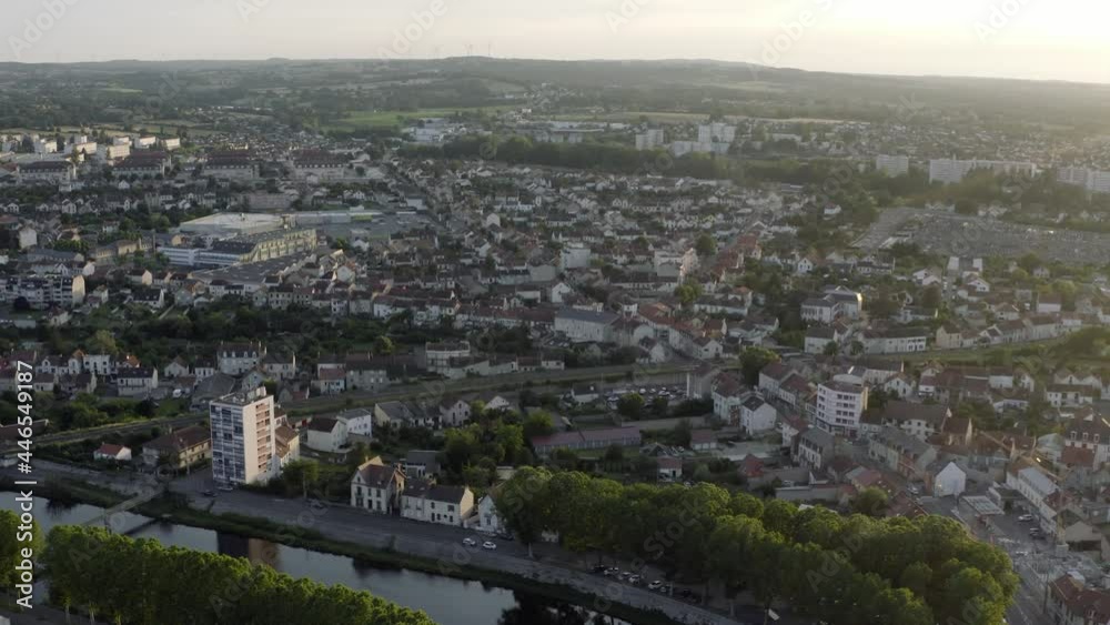 Drone Aerial shot of Montluçon in central France. Montlucon is the largest commune in the Allier department and belongs to the Auvergne-Rhône-Alpes region. A panorama of the french city at sunset. Drone Aerial shot of Montluçon in central France. Montlucon is the largest commune in the Allier department and belongs to the Auvergne-Rhône-Alpes region. A panorama of the french city at sunset.