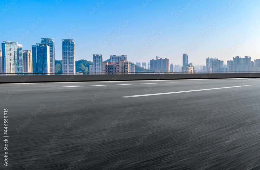 Road and modern city buildings background Road and modern city buildings background