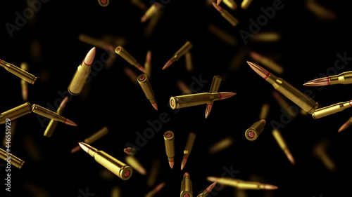 Foto Falling bullets on a black background with depth of field.