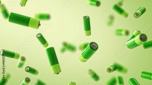 Multiple falling green batteries with depth of field. Green energy concept.