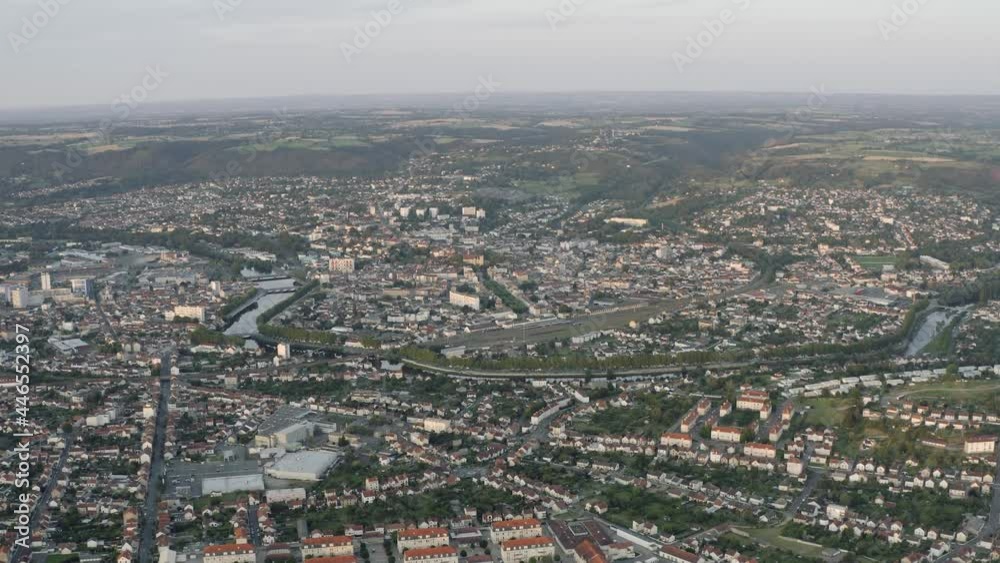 Drone Aerial shot of Montluçon in central France. Montlucon is the largest commune in the Allier department and belongs to the Auvergne-Rhône-Alpes region. A panorama of the french city at sunset. Drone Aerial shot of Montluçon in central France. Montlucon is the largest commune in the Allier department and belongs to the Auvergne-Rhône-Alpes region. A panorama of the french city at sunset.