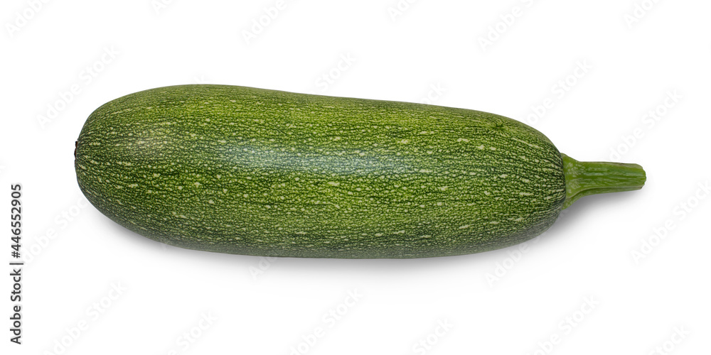 Green speckled zucchini isolated on a white background.Fresh, green vegetable.It is used for labels,posters and web design. Green speckled zucchini isolated on a white background.Fresh, green vegetable.It is used for labels,posters and web design.