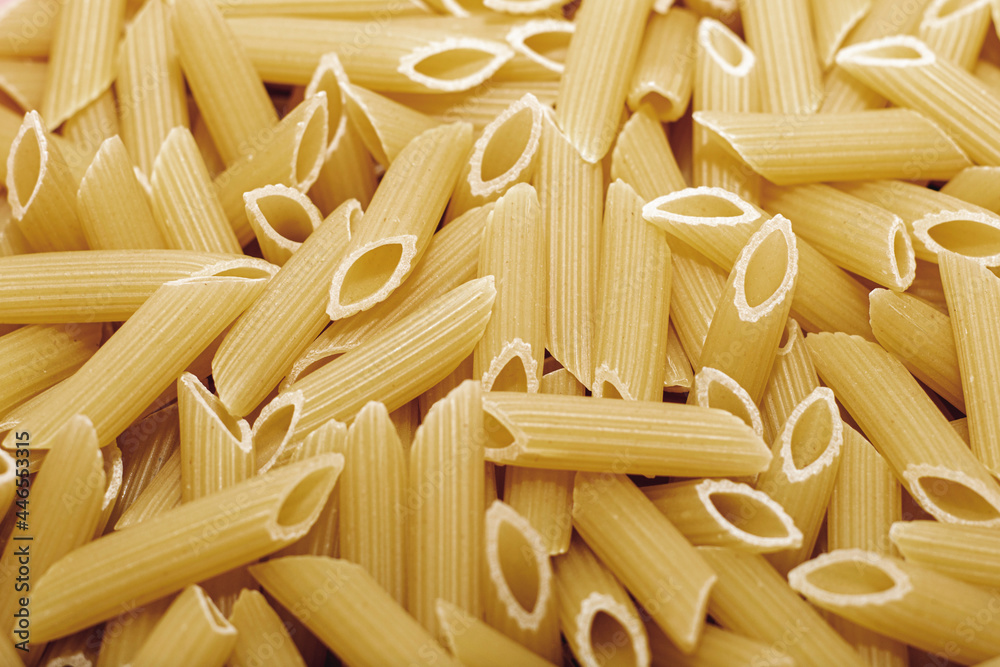 italian penne pasta fluted close - up background backdrop italian penne pasta fluted close - up background backdrop