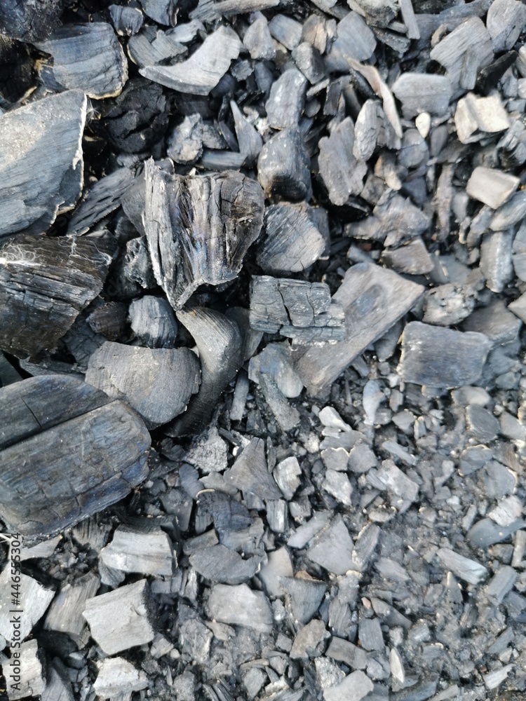 coal remains of a fire black ash cooled