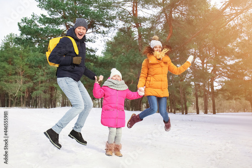 Happy family in park on win...