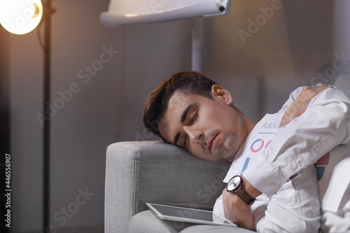Tired businessman sleeping ...