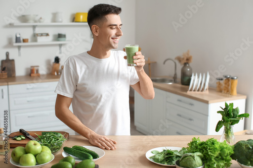 Young man drinking healthy ...