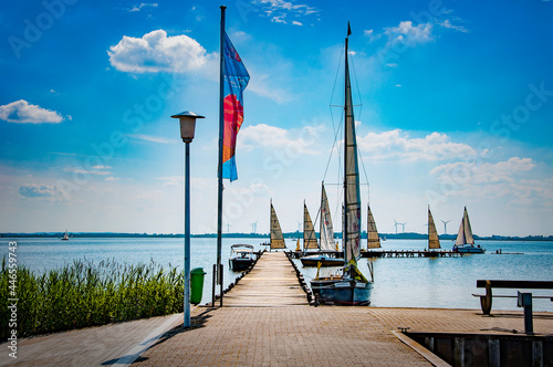 BOHMTE, GERMANY. JUNE 27, 2021 Dammer Natural Park. Yachts moored in the pier photo