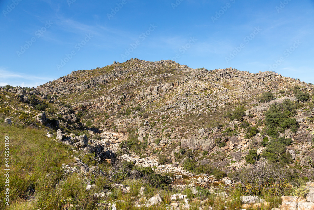 Naklejka premium Mountains and Valley with River in the amazing Bain's Kloof close to Wellington in the Western Cape of South Africa
