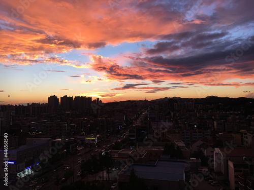 sunset over the city sky