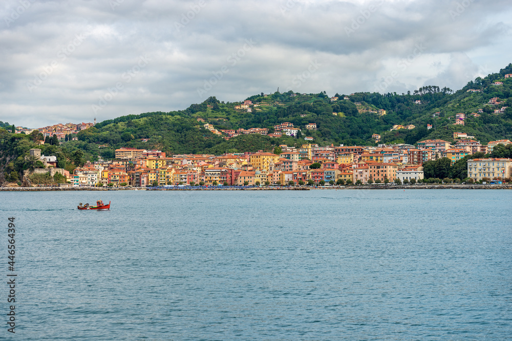 Fototapeta premium The small village of San Terenzo seen from the sea, Gulf of La Spezia, municipality of Lerici, Mediterranean sea, Liguria, Italy, Europe. 