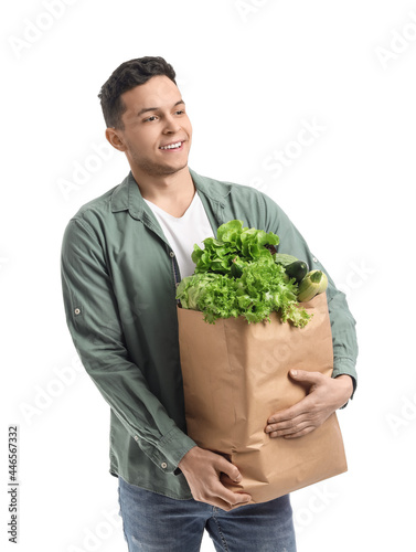 Young man and paper bag wit...