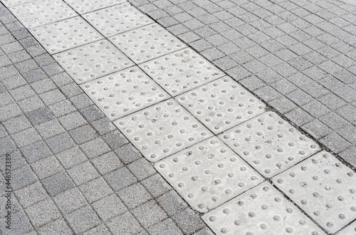 Tactile sidewalk concrete tile outside