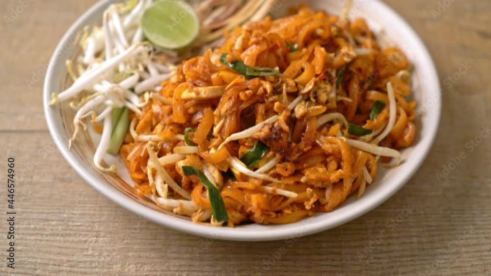 stir-fried noodle with tofu and sprouts or Pad Thai - Asian food style stir-fried noodle with tofu and sprouts or Pad Thai - Asian food style