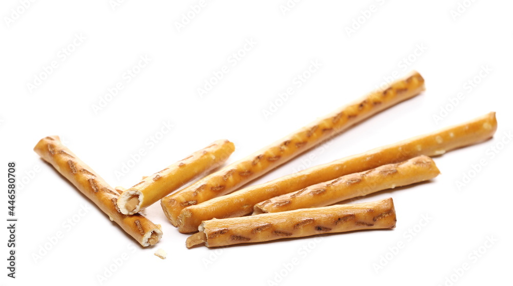Cracker pretzel sticks filled with peanuts isolated on white background