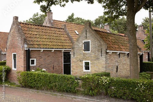 Waddenzee coast Moddergat Paesens Friesland Netherlands. Unesco world heritage. Village and historic fishermen houses.